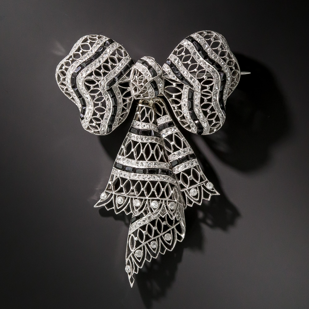 Edwardian Diamond and Onyx Bow Knot Brooch, French
