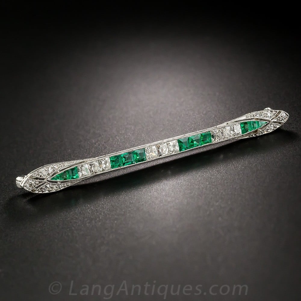 Art Deco French-Cut Diamond and Emerald Bar Brooch.