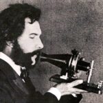 Alexander Graham Bell Speaking into a Prototype Telephone in 1876.