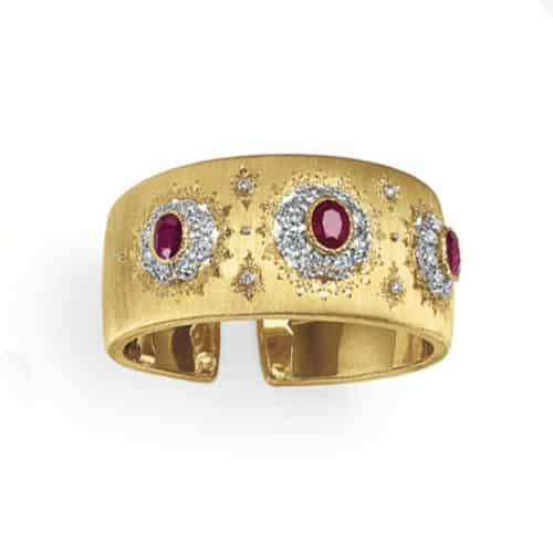 M. Buccellatti Ruby, Diamond and 18K Yellow Gold Hinged Cuff Bracelet. Photo Courtesy of Christie's.