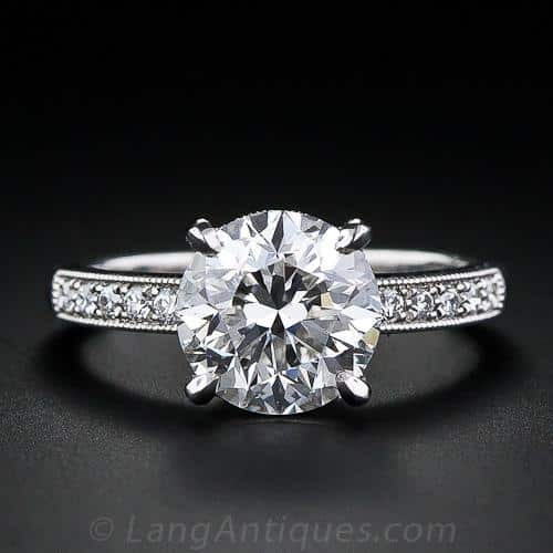 Transitional-Cut Diamond and Platinum Engagement Ring with a Split-Level Gallery and Diamond Shoulders.