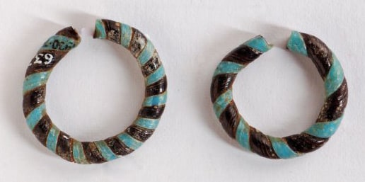 Blue and Brown Glass Penannular Earrings with Gap for Pinching Lobe. New Kingdom, Egypt.