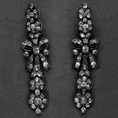 Pair of Earrings. Ribbon-Bows with Long Pendants. Silver and Gold with Closed-Backs and Set with Yellow Chrysoberyls, the Settings Bordered with Gold Beads. 1726-1775 © Trustees of the British Museum.
