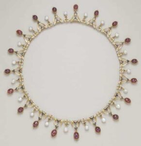 Giuliano Enameled Garnet and Natural Pearl Necklace c.1870. Photo Courtesy of Christie's.