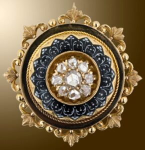 Victorian Dome Brooch Topped with Rose Cut Diamonds withing a Wreath of Grisaille Black and White Foliate Enamel.