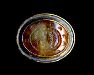 Motto Cameo Carved in Chalcedony c.1 AD. © Trustees of the British Museum.