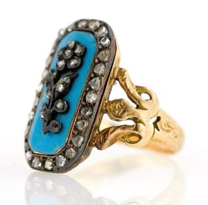 Typical Turquoise Enamel and Diamond Neoclassical Ring. Note the Use of Both Yellow Gold and Silver as Well as the Shank Spreading Out into 3 Towards the Head.