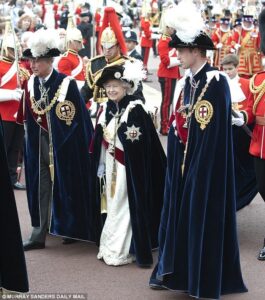 The Queen, Prince Charles and Prince William in their Order of the Garter Regaila. Photo Courtesy of the Daily Mail.