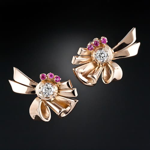 Retro-era ruby and diamond ribbon ear clips.