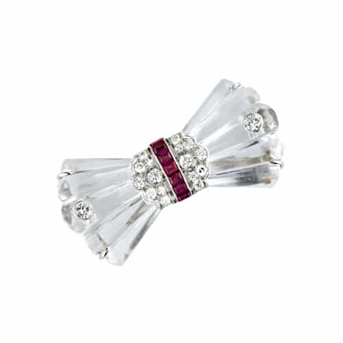 Carved Rock Crystal Quartz Bow Brooch with Ruby and Diamond Accents. Photo Courtesy of Frances Klein Classic Jewels..