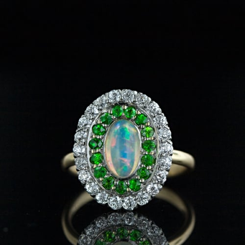 Shreve Opal, Diamond and Demantoid Ring.