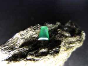 Picture of Trapeze Cut Habachtal Emerald Placed on Host Rock.