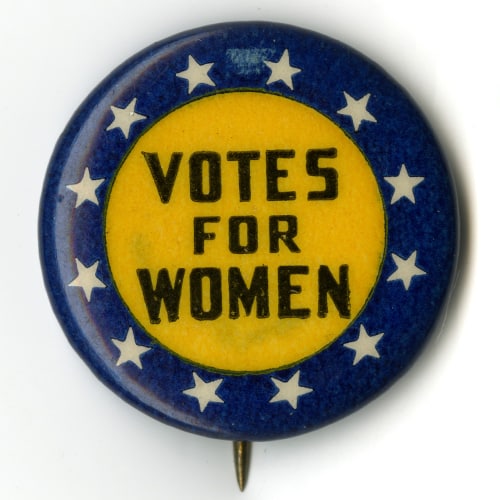 U.S. Suffrage Button in NAWSA's Official Yellow Color with 12 Stars Representing the States Where Women had Full Suffrage. Photo Courtesy of the National Museum of American History at the Smithsonian.