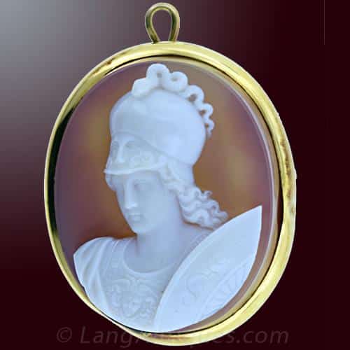 Hardstone Cameo Depicting Athena Wearing a Helmet with a Live Serpent on Top and a Secondary Visage on the Visor. Her Chest Armor Displays the Aegis of Zeus.