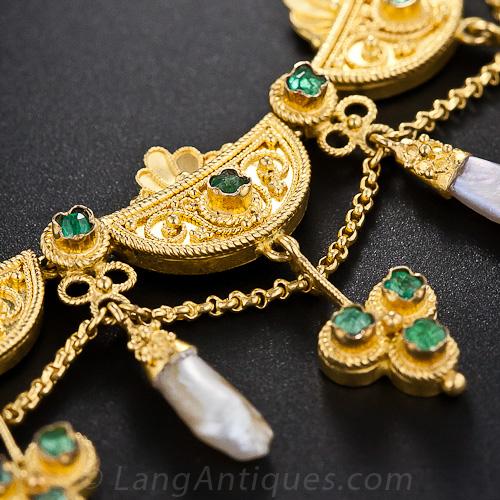 Victorian Etruscan Revival Emerald Necklace with Emerald Set Trefoil Elements and Freshwater Pearl Pendants.