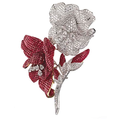 Van Cleef & Arpels Serti Mysterieux Ruby and Diamond "Pavot" Brooch, 1988. Photo Courtesy of Christie's.