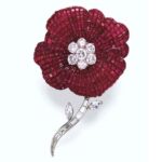 Van Cleef & Arpels Serti Mysterieux Ruby and Diamond "Millennium" Brooch, 2000. Photo Courtesy of Christie's.