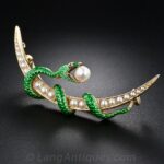 Antique Natural Pearl and Enamel Snake and Crescent Pin.