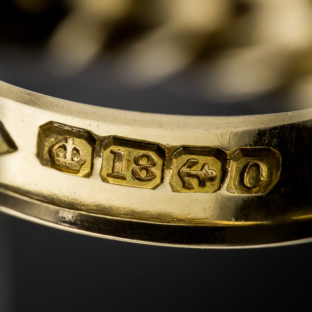 United Kingdom Birmingham Gold Hallmark (Horizontal Anchor in Cut Corner Square,) Date Letter O (1863,) Crown and 18 (18K - 1798-1974.)