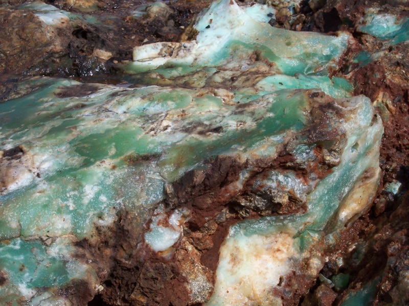 9 Ton Chrysoprase Boulder with Gem Surface Partially Exposed.