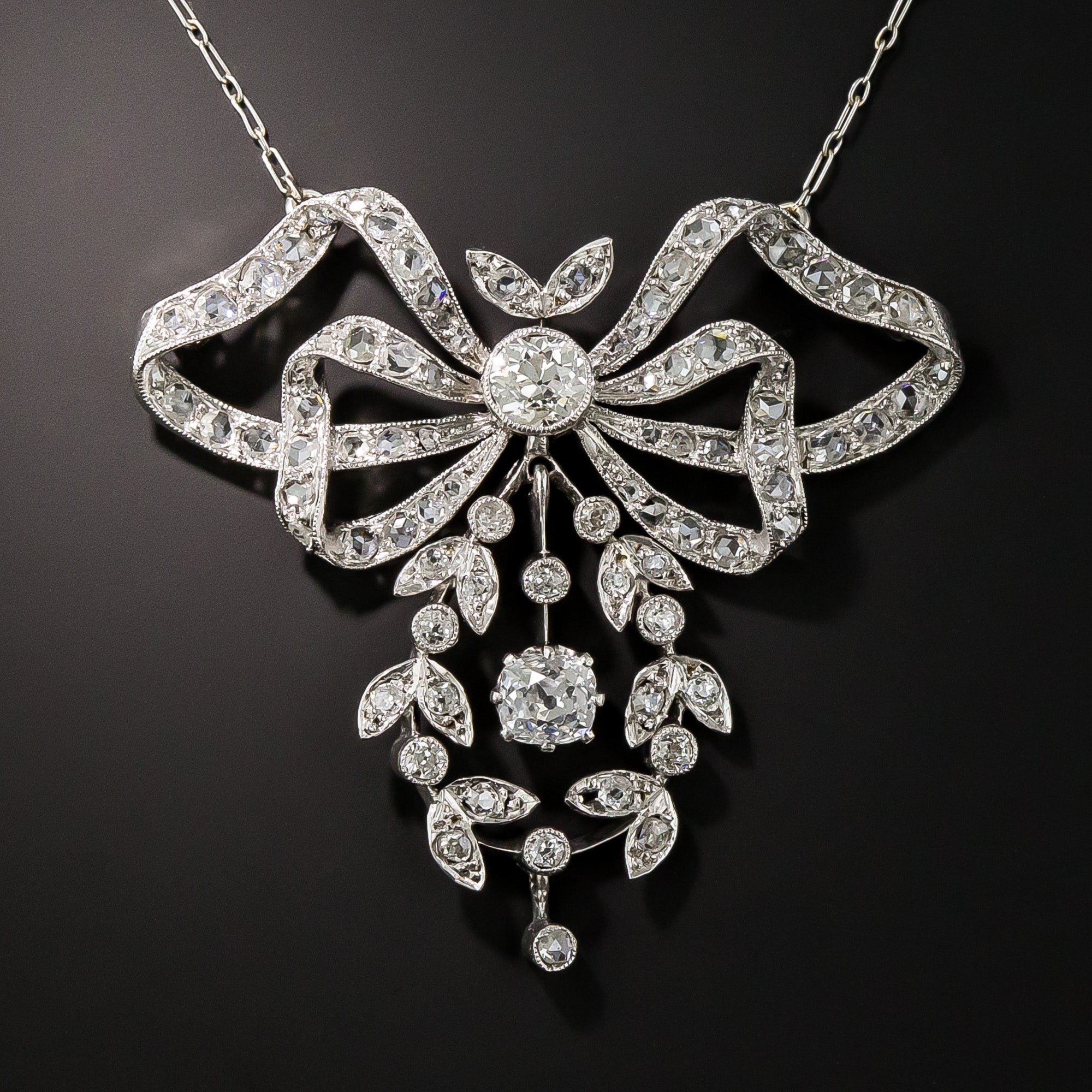 Edwardian Garland and Bow Motif Diamond Necklace.
