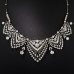 Belle Epoque Floral, Foliate and Lacework Motif Diamond Festoon Necklace.