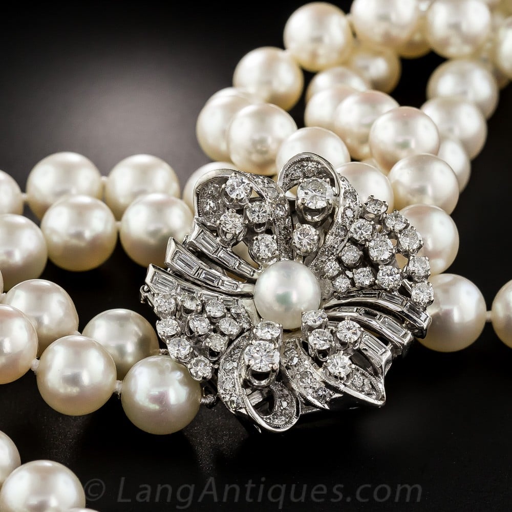 Floral Diamond Clasp on a Double Strand of Pearls.