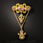 Repoussé Georgian Pink Topaz and Chrysoberyl Brooch with Cuir Roulé Motifs.