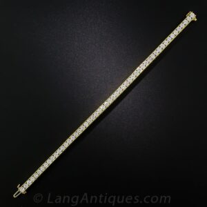 Diamond and Yellow Gold Tennis Bracelet.