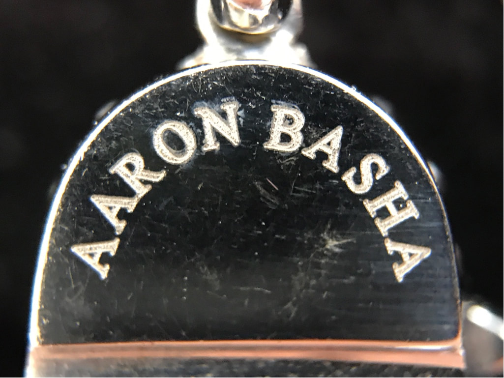 Basha, Aaron