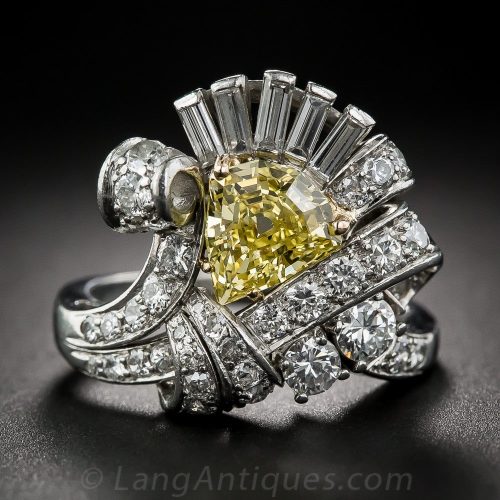 Shield-Shaped Intense Fancy Yellow Diamond, Platinum, and Diamond Cocktail Ring.