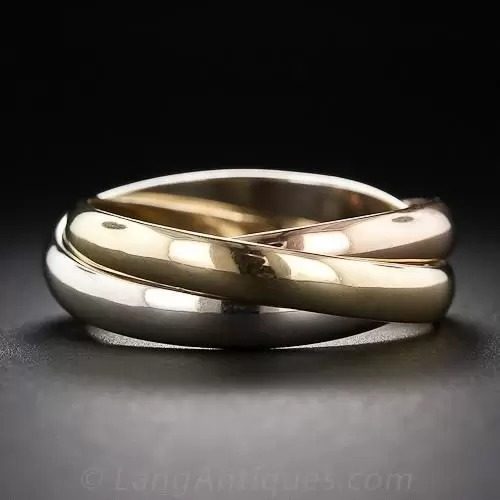 Cartier 18k Tri Color Gold Rolling Ring.