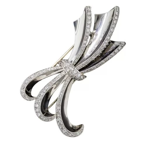 Art Deco/Retro Platinum, Diamond Bow Brooch. Art Deco/Retro Platinum, Diamond Bow Brooch.