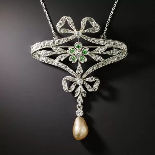 French Belle Epoque Diamond, Demantoid Garnet, and Natural Pearl Pendant/Brooch with Bows. French Belle Epoque Diamond, Demantoid Garnet, and Natural Pearl Pendant/Brooch with Bows.