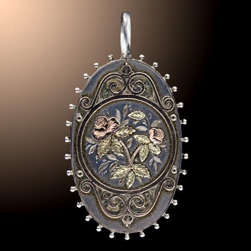 Victorian Silver Locket with Gold Floral Appliqué and Oxidized Finish.