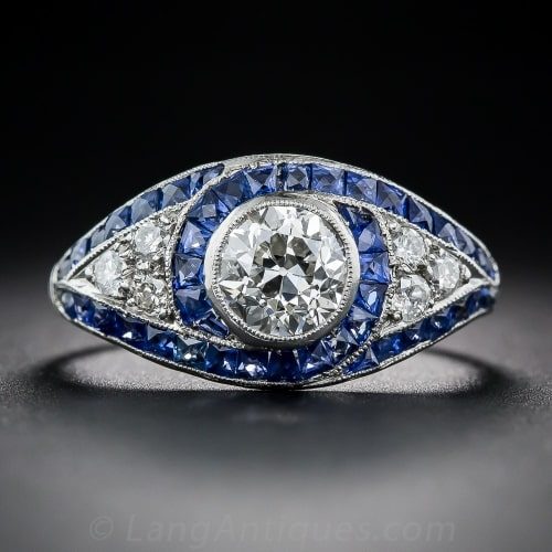 Art_Deco_Sapphire_Diamond_Engagement_Ring Art Deco Diamond and Platinum Engagement Ring with Swirls of French-Cut Sapphire Outlines and Millegrained Edges.