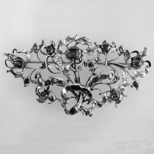 Brooch in the Form of Flowers and Leaves. Silver with a Closed-Back and Set with Rubies and Diamonds. 1726-1775 © The Trustees of the British Museum.