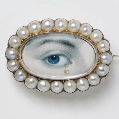 Eye Miniature with Tears Set in a Brooch with Pearl Frame c.1800.
