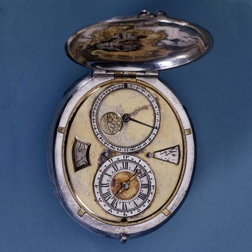 Oval_Silver_Cased_Verge_Watch_with_Date_Indicator. Oval Silver Cased Verge Watch with Date Indicator. 1670-1680. © The Trustees of the British Museum.
