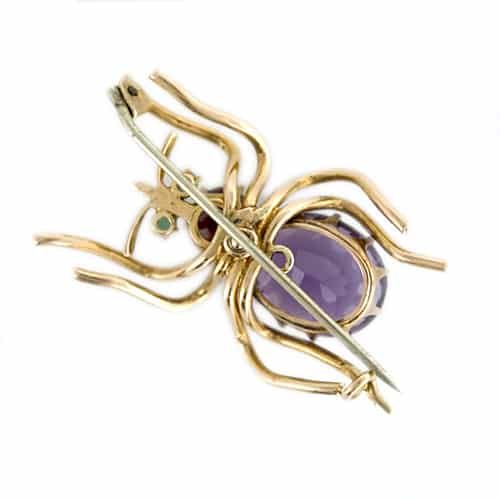 Reverse View of Antique Amethyst and Garnet Spider Brooch Featuring the Pinstem. Reverse View of Antique Amethyst and Garnet Spider Brooch Featuring the Pinstem.