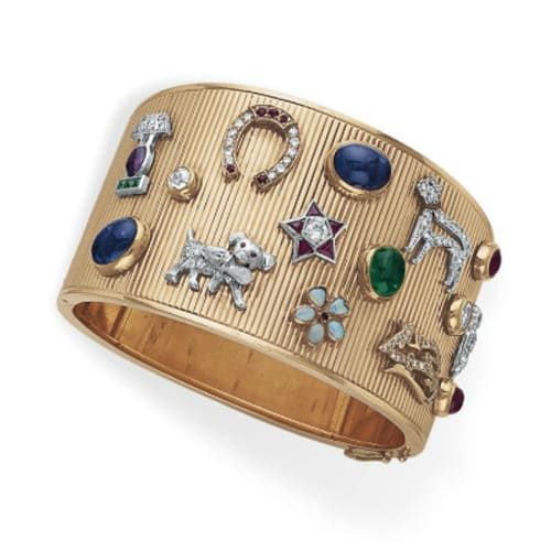 Retro Cuff Bracelet Enhanced by Applied Charms and Stickpins c.1945.