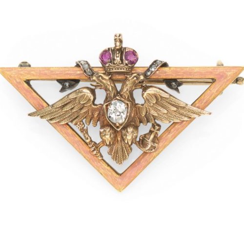 Diamond, Ruby, Guilloché Enamel, Gold Imperial Presentation Brooch. Fabergé, Alfred Thielemann, c.1899-1904. Photo Courtesy of Christie’s. Diamond, Ruby, Guilloché Enamel, Gold Imperial Presentation Brooch. Fabergé, Alfred Thielemann, c.1899-1904. Photo Courtesy of Christie's.