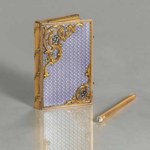 Diamond, Moonstone, Guilloché Enamel, and Bi-Color Gold “Carnet-De-Bal,” Fabergé, Michael Perchin, c.1890. Photo Courtesy of Christie’s. Diamond, Moonstone, Guilloché Enamel, and Bi-Color Gold "Carnet-De-Bal," Fabergé, Michael Perchin, c.1890. Photo Courtesy of Christie's.