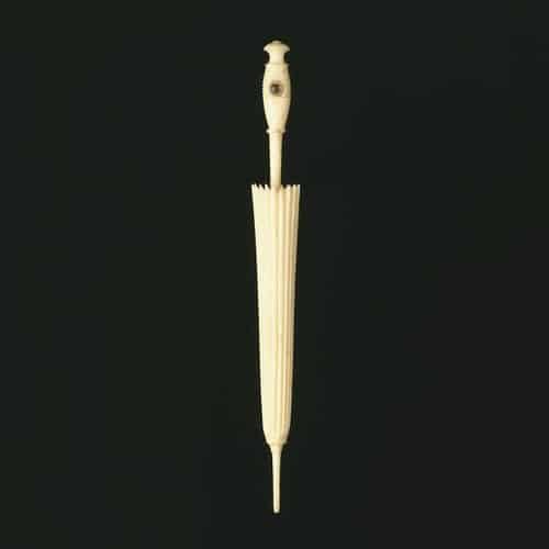 A Carved Ivory Souvenir Needlecase Designed as an Umbrella with a Stanhope Lens in the Handle. Photo Courtesy of the Victoria and Albert Museum Collection.