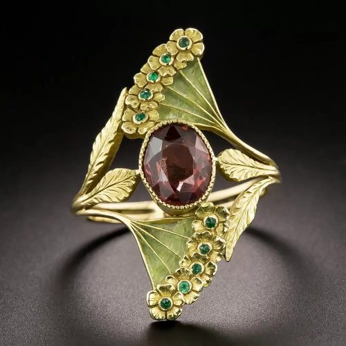 French Art Nouveau Plique-à-Jour Garnet and Emerald Dinner Ring.
