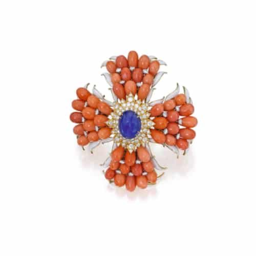 Webb Coral, Sapphire and White Enamel Pendant Brooch. Photo Courtesy of Sotheby's.