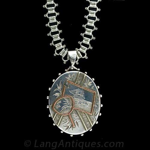 Antique Silver Locket is Etched with a Maritime and Fauna Motif in a Japonesque Style.