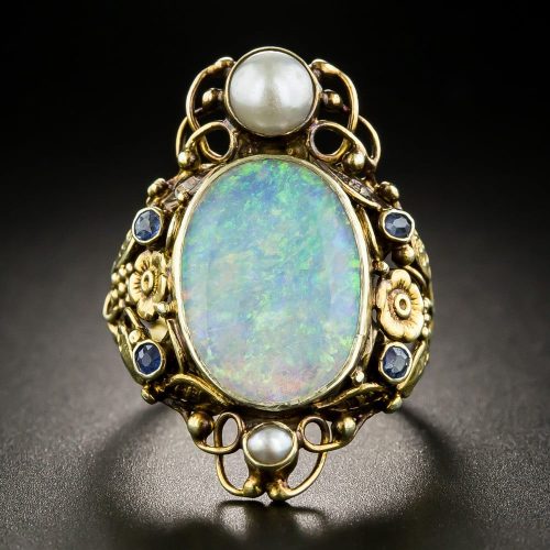Arts & Crafts Opal, Sapphire, and Pearl Dinner Ring.