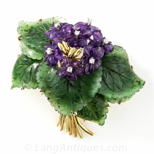 Carved Nephrite and Amethyst Floral Brooch .