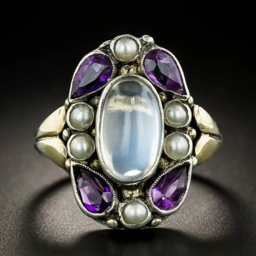 English Arts & Crafts Moonstone and Amethyst Ring. Bernard Instone.